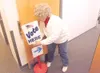 ROBERT DeBERRY/Frontiersman Mat-Su Borough election worker Mary
Knutson sets out a “vote here” sign Monday morning in preparation
for today’s municipal elections.