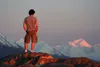 A hiker peers out at the Knik River Valley from a vantage point atop Bodenburg Butte. Adventurers of all kinds are being sought for the Talkeetna Adventure Film Festival, which will be held A