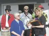 Gerry Keeling, front left, is honored as Palmer’s Citizen of the
Year while Mayor DeLena Johnson reads a proclamation at this year’s
Palmer Pride Picnic. (Photo Courtesy Linda Combs)