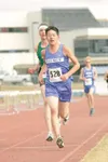 ROBERT DeBERRY/Frontiersman Palmer's Jake Parisien leads during
the fourth lap of the boys 5,000-meter race during the Palmer
Relays track meet Saturday.