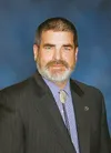 BIZ briefs Dave Cruz.jpg