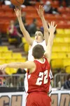 Colony sophomore Damien Fulp fires a shot during a state consolation semifinal loss to Kenai at Sullivan Arena in Anchorage Friday. Bruce Eggleston/MatSuSports.net