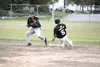 Chugiak's Deven Ferriss beats the throw to steal second base during an 8-4 win over the Palmer Pioneers July 1 in Palmer. Jeremiah Bartz