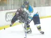 ROBERT DeBERRY/Frontiersman Alaska defenseman Sean McNeely,
right, is one of two players named co-MVP for the 2008-2009
season.