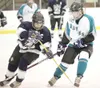 ROBERT DeBERRY/Frontiersman Mat-Su forward Louisa Good moves in
on Chugiak-Eagle River’s Larissa Mergala.