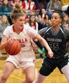 Wasilla junior Azlynn Brandenburg tries to drive the baseline during a loss to Sierra Canyon of Chatsforth, California, in the girls' championship game of the Doc Larson Roundball Classic Fri