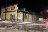 The KFC/A&amp;W restaurant in Wasilla loses an entire side of the building to the severe winds. Jacob Mann/Frontiersman