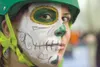 Devil’s Club team member Nautical Nuisance puts on her game face
before the start of Saturday’s contest. For more on the roller
derby and Wasilla’s own Denali Destroyer Dolls, see Tuesday’s
s