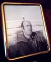 Christine Woods-Soulak couldn't recall when this portrait of her first husband, Warren Woods, was taken, but keeps it on display in her Palmer home, along with pictures of her two sons and la