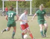 JEREMIAH BARTZ/Frintiersman Wasilla’s Amy Jo Coonrod, center,
splits the defense and drives the ball by Colony’s Katie Gonski,
left, and Alex Coon during a 1-1 tie at Wasilla High School.