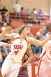 ROBERT DeBERRY/Frontiersman Wasilla’s Jack Troshynski goes down
with the ball during the Warriors’ 64-48 win over the Dimond Lynx
at Wasilla High School on Saturday.