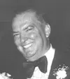 DELBERT L. SMITH