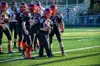 Jackson Loveless walks the ball into the end zone during a game against Eielson. Loveless, a Houston team manager and tremendous fan, had the chance to wear the red, white and black before he