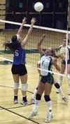 Palmer setter Jayme Irvine leaps for a block in Palmer's 3-0 win
over Colony in the first annual Cabbage Bowl Tuesday. Photo by
JEREMIAH BARTZ/ Frontiersman.
