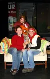 Sarah Hendricks, top, and Aurora Pease and Hillarie Putnam,
seated left to right, have spent much of their childhoods on stage
at Valley Performing Arts. Photo by CASEY RESSLER/Frontiersman.