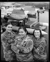 From left to right, U.S. Air Force Senior Airman Gates Winder, a munitions controller; Tech. Sgt. Arlin Verbinski, a munitions operations supervisor; and Capt. Elizabeth Atadero, director of 