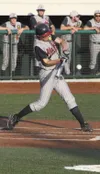 JEREMIAH BARTZ/Frontiersman Alaska Road Warriors infielder
Jonathon Boyer turns on a pitch and drives it into the field during
an 11-3 loss to South Anchorage Friday.