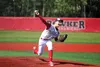 Wasilla's Carter Huston fires a pitch during a recent Road Warriors win over Kenai. Wasilla head coach Ken Ottinger said he expects his squad to feature a deep pitching staff. Jeremiah Bartz/