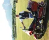 CASEY RESSLER/Frontiersman Wasilla's Jim Fleming takes in some
sunshine and good weather during the first morning of the state HOG
rally in Palmer Friday. Fleming said he's been riding Harley