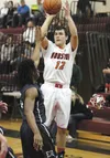 Matt Barron lets go of a jump shot during a game against Eagle River recently. Barron helped the Hawks clinch a third-place finish during the Southcentral Conference Championships in Cordova 