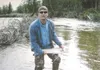 Photo courtesy of Tim Almberg Anchorage angler Tim Almberg
displays a 30-inch rainbow trout he caught Sunday in Willow
Creek.