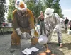Patrick Garley and Djean Stevenson pour molten metal into a mold at the Art on Fire event at the Museum of Alaska Transportation and Industry in Wasilla. This year’s event is from 10 a.m. to 