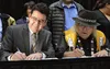 U.S. Department of the Interior Deputy Secretary Michael L. Connor (left) and Ahtna Intertribal Resource Commission Chairman Christopher Gene signing theCooperative Agreement at the Bureau of