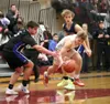 Houston guard Cody Wyrick grabs a loose ball during a win over Palmer. Bruce Eggleston/matsusports.net