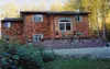 By lifting their house off its foundation, the Coyles were able
to double the square footage of their home. The project began in
1998, and by 2002 both the interior and the exterior renovatio