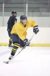ROBERT DeBERRY/Frontiersman Alaska Avalanche rookie Blake
Huppert moves the puck across the ice during practice Thursday.