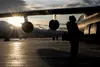 U.S. Air Force Staff Sgt. Damien Sloan, 821st Contingency Response Squadron, contingency response maintenance craftsman assigned to Travis Air Force Base, Calif., conducts de-icing training o