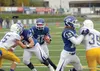 Palmer football Wayne Hershman follows blockers Travis Wheeler and Aaron Christiansen into the end zone during a 41-20 win over Kodiak Sept. 26 at Palmer High School. Courtesy of Bruce Eggles