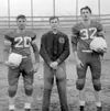 Jack Worelage, Coach Norm Rousey Sr. and Robert ‘Bob’ Berry pose for a photo on the Palmer High School football field, located where the Alaska Veterans and Pioneers Home is in Palmer. Coach 