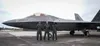 U.S. Air Force Brig. Gen. Jeremy T. Sloane, 36th Wing commander, center, Col. Travolis Simmons, 3rd Wing commander, right and Lt. Col. Matthew Tromans, 525th Fight Squadron commander, left st