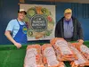 Bruce Bush stands with Kristi Short at the Bushes Bunches stand within the Alaska State Fairgrounds. Jacob Mann/Frontiersman