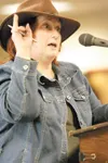ROBERT DeBERRY/Frontiersman Palmer resident Carolyn Johnson
testifies before the Mat-Su Borough Assembly in support of funding
for construction of a new animal shelter. “I am not going to tak
