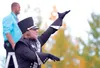 Drum major Jessica Rentz directs the Colony High School marching band under the supervision of teacher Jamin Burton during a Sept. 17 rehearsal for the Grand National Championships in Indiana