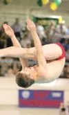 ROBERT DeBERRY/Frontiersman Wasilla Warrior David Kennedy shows
good form during the boys diving event at the state swimming
championships Saturday in Anchorage.