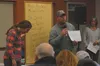 Fishhook resident Shane Turner tells the audience at Government Peak Chalet on Thursday why they should vote him onto the Fishhook Community Council Board. Turner and Sheri Musgrave, right, w