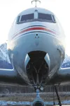 Morning light glints off the fuselage of a DC-4 prop plane at Palmer Municipal Airport Dec. 10. The plane belongs to Alaska Air Fuel, one of two prospective new clients at the airport. BRIAN 