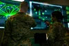 Marines with Marine Corps Forces Cyberspace Command pose for photos in the cyber operations center at Lasswell Hall aboard Fort Meade, Maryland, Feb. 5, 2020. MARFORCYBER Marines conduct offe