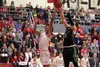 Colony junior Sullivan Menard gets a hand on the ball as Wasilla junior tries to go to the basket during Wasilla's 48-39 win over the Knights in the Northern Lights Conference Championships b
