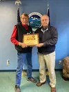 Wasilla Mayor Bert Cottle receives a member of the year award from APOA. Courtesy photo.