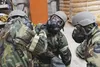 Airmen participate in Exercise Polar Force 17-4 at Joint Base Elmendorf-Richardson April 6. During the routine training exercise, Airmen donned Mission Oriented Protective Posture gear and en