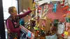 Thrifters Rock's Vicki Hoyman points to a display for the store's crafty Show Challenge. Jacob Mann/Frontiersman