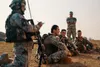 Georgian soldiers with the 32nd Georgian Infantry Battalion conduct a Key Leader Engagement during the Mission Rehearsal Exercise at Patuhk Training Area, Georgia, Oct. 27, 2020. The Mission 