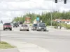 ROBERT DeBERRY/Frontiersman Traffic stops at the intersection of
the Palmer-Wasilla and the Glenn highways Thursday morning. The
state Department of Transportation is backing off plans for
bu
