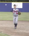 Alaska Road Warriors infielder Russ Ruta makes the throw to
first base during a 9-6 win over West Anchorage last Saturday. Ruta
is part of a deep team that finished second in the state last y