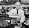 Fernand Petiot behind the bar.