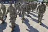 Inbound Soldiers from the United States to Europe, get comfort items from the shoppette then march back to the Deployment Processing Center, Rhine Ordnance Barracks in Kaiserslautern, Germany